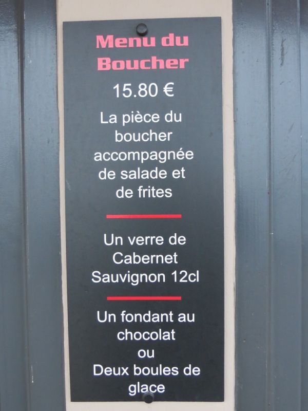 Butcher's piece and French fries, wine and something with chocolate