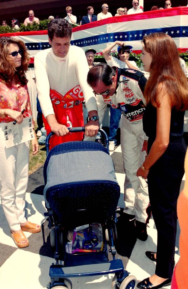 Buffy and Michael Waltrip's baby Margaret being admired by Dale and Teresa Earnhardt 1998 (2): NASCAR Photography By Darryl Moran
