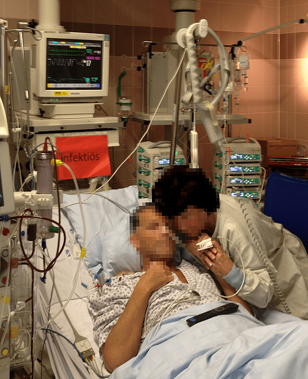 Patient lying in hospital bed in intensive care unit in Germany in 2015