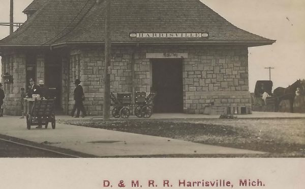 RR NE Harrisville MI RPPC 1908 D&MRR DEPOT Detroit & Mackinac Railroad Harrisville people donate the stone to the Railroad so that that the railway company would build a stone depot1