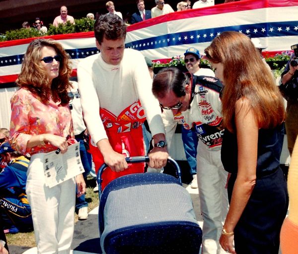 Buffy and Michael Waltrip's baby Margaret being admired by Dale and Teresa Earnhardt 1998: NASCAR Photography By Darryl Moran