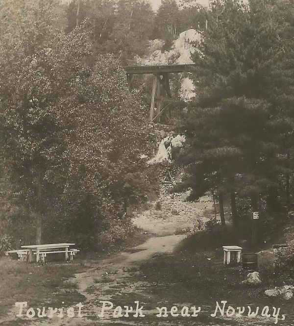 UP Norway MI RPPC 1920s NOISY W&MRR Wisconsin & Michigan RAILROAD TRESSEL above VACATION TOURIST PARK CAMP Dirt Street Horse and Buggy and early Automobile Era PHOTOGRAPHER UNK 61