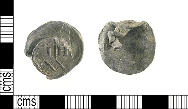 <div class='fn'> A Post Medieval lead alloy cloth seal probably dating 16th - 17th century.</div>