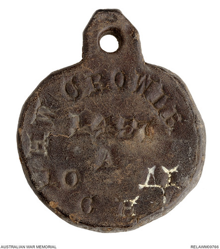 The leather Identity disc of Herbert Crowle from Gallipoli...