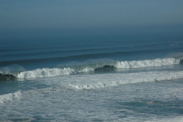 Offshore wind on waves, from a long distance away, San Gregorio State Beach, Pescadero, California, USA