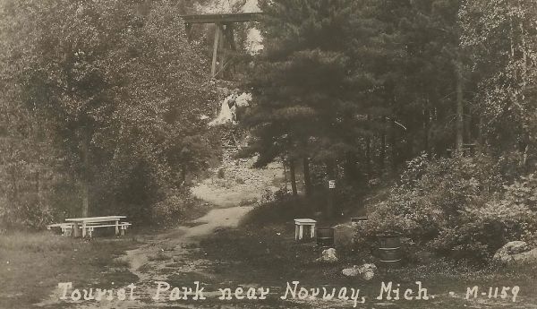 UP Norway MI RPPC 1920s NOISY W&MRR Wisconsin & Michigan RAILROAD TRESSEL above VACATION TOURIST PARK CAMP Dirt Street Horse and Buggy and early Automobile Era PHOTOGRAPHER UNK 63