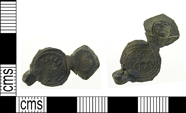 <div class='fn'> Incomplete post medieval lead cloth seal, formed of four discs doubled over with one circular and one lozenge shaped.</div>