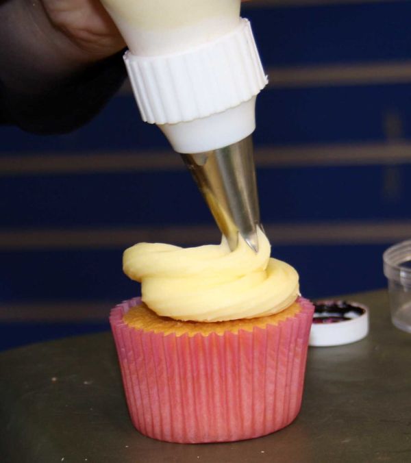 Icing the cup cakes