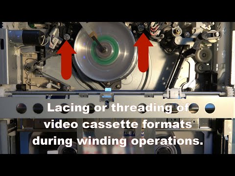 To lace or to unlace, that is the question. Video deck threading during tape wind.